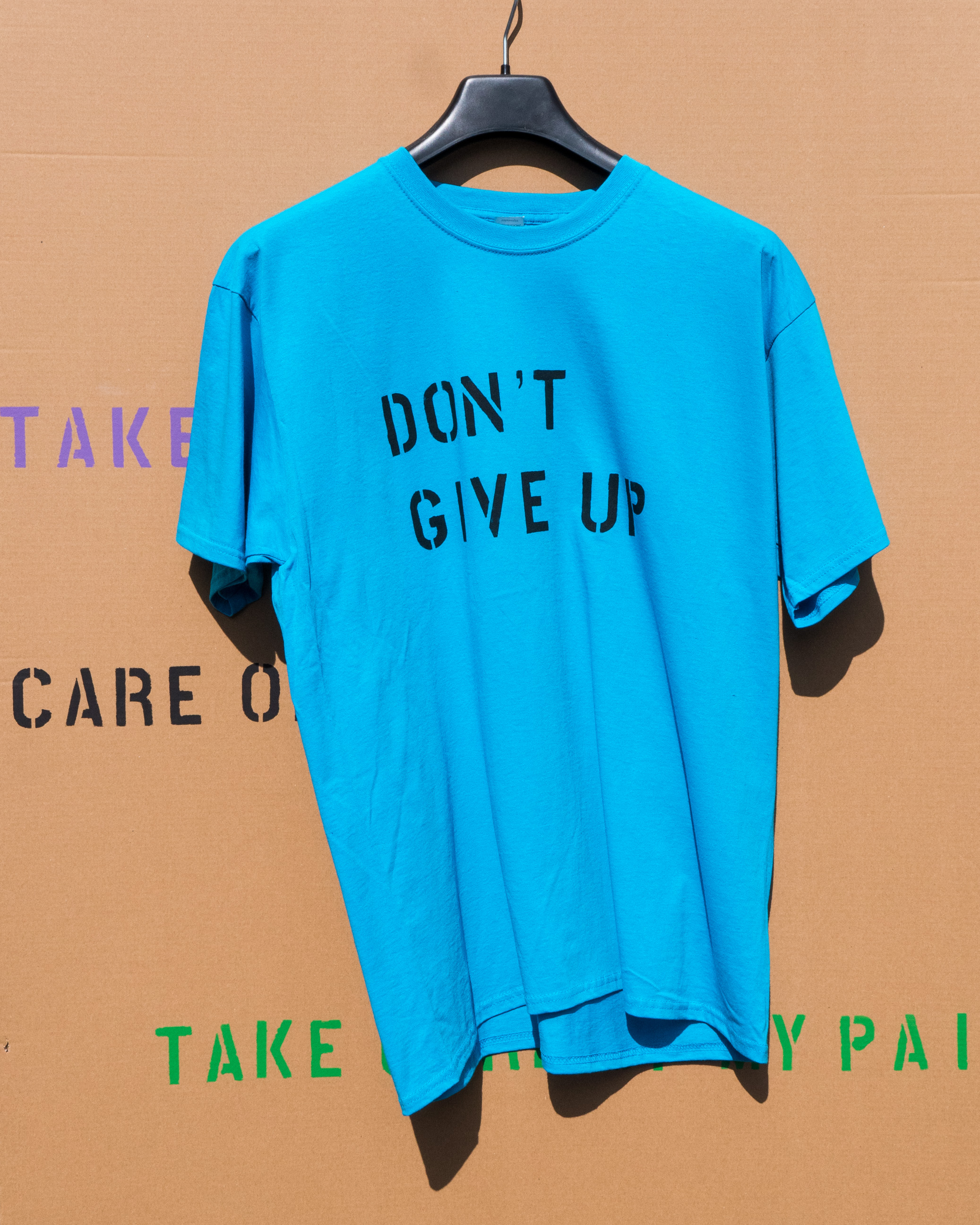 T-shirts Don't Give Up image